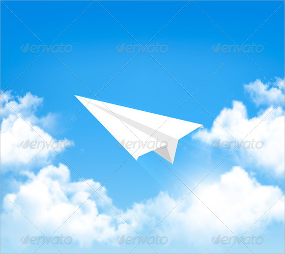 paper airplane in sky with clouds